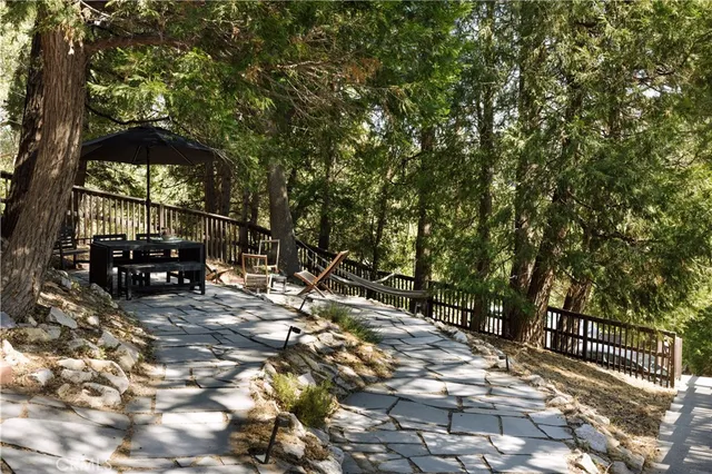 a view of outdoor space with deck and yard