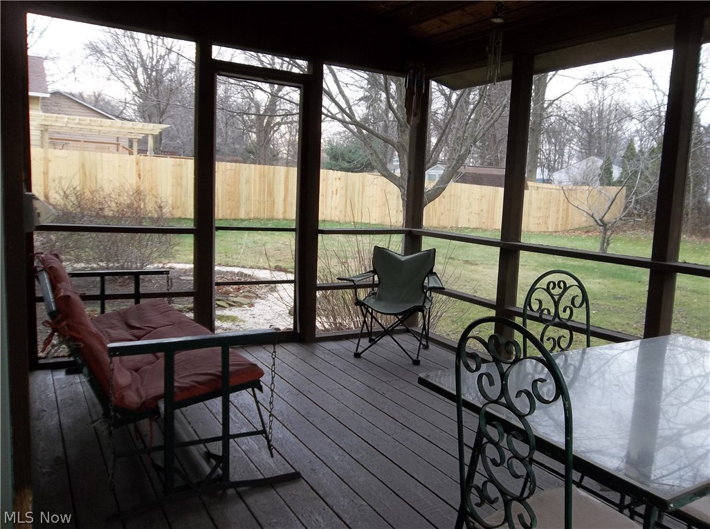 70 Boulder Ridge Place Painesville, OH 44077 - Photo 23 of 26 Rear enclosed screened in porch allows you to enjoy the rear yard without the annoyance of pesty insects!
