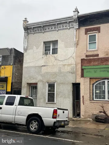 a car parked in front of a house