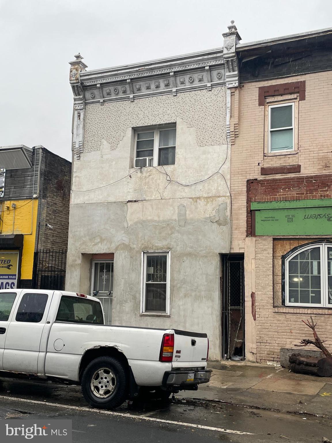 a car parked in front of a house
