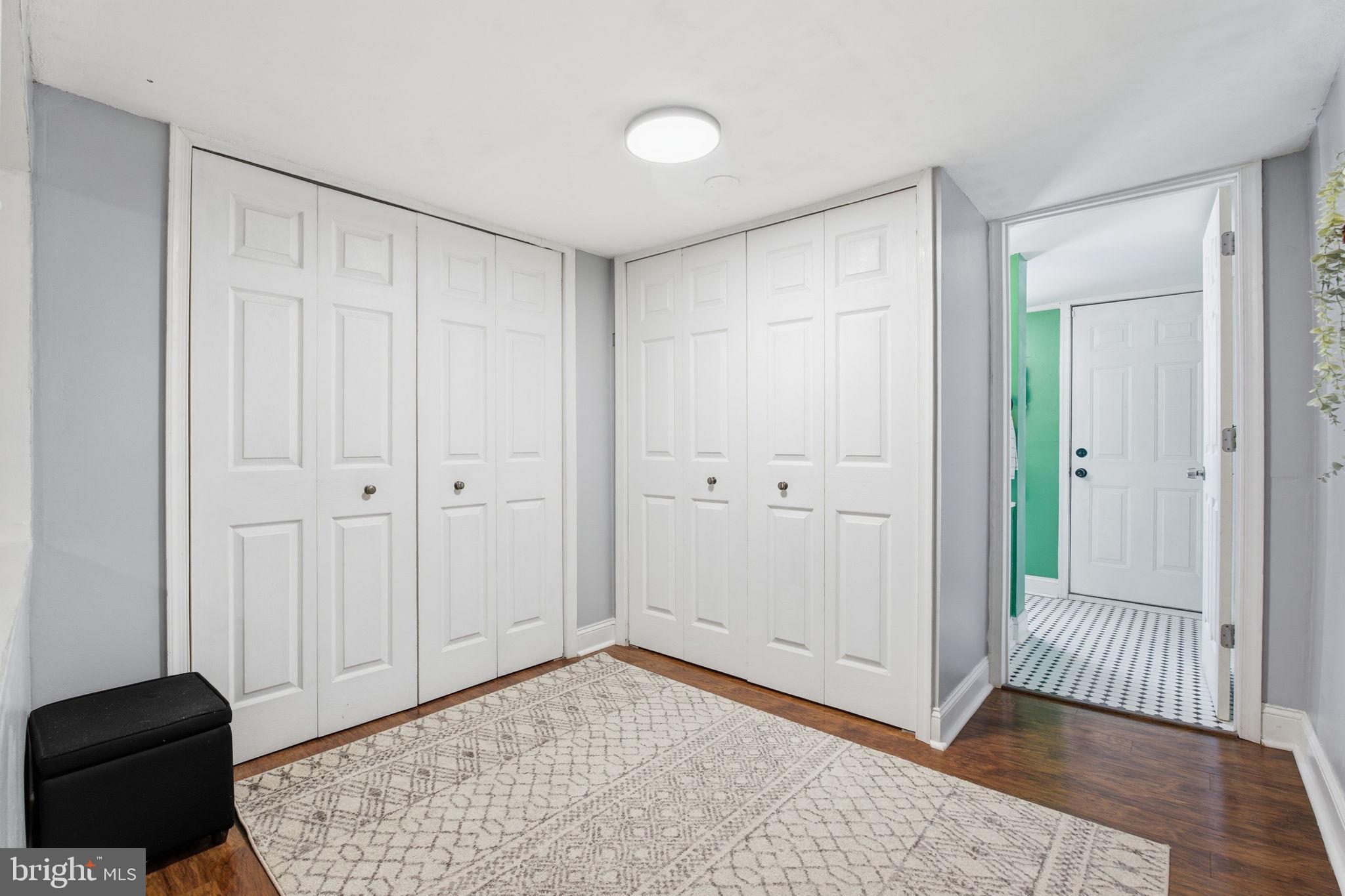 1433 Patapsco Street Baltimore, MD 21230 - Photo 13 of 26 a view of a room with wooden floor and cabinet