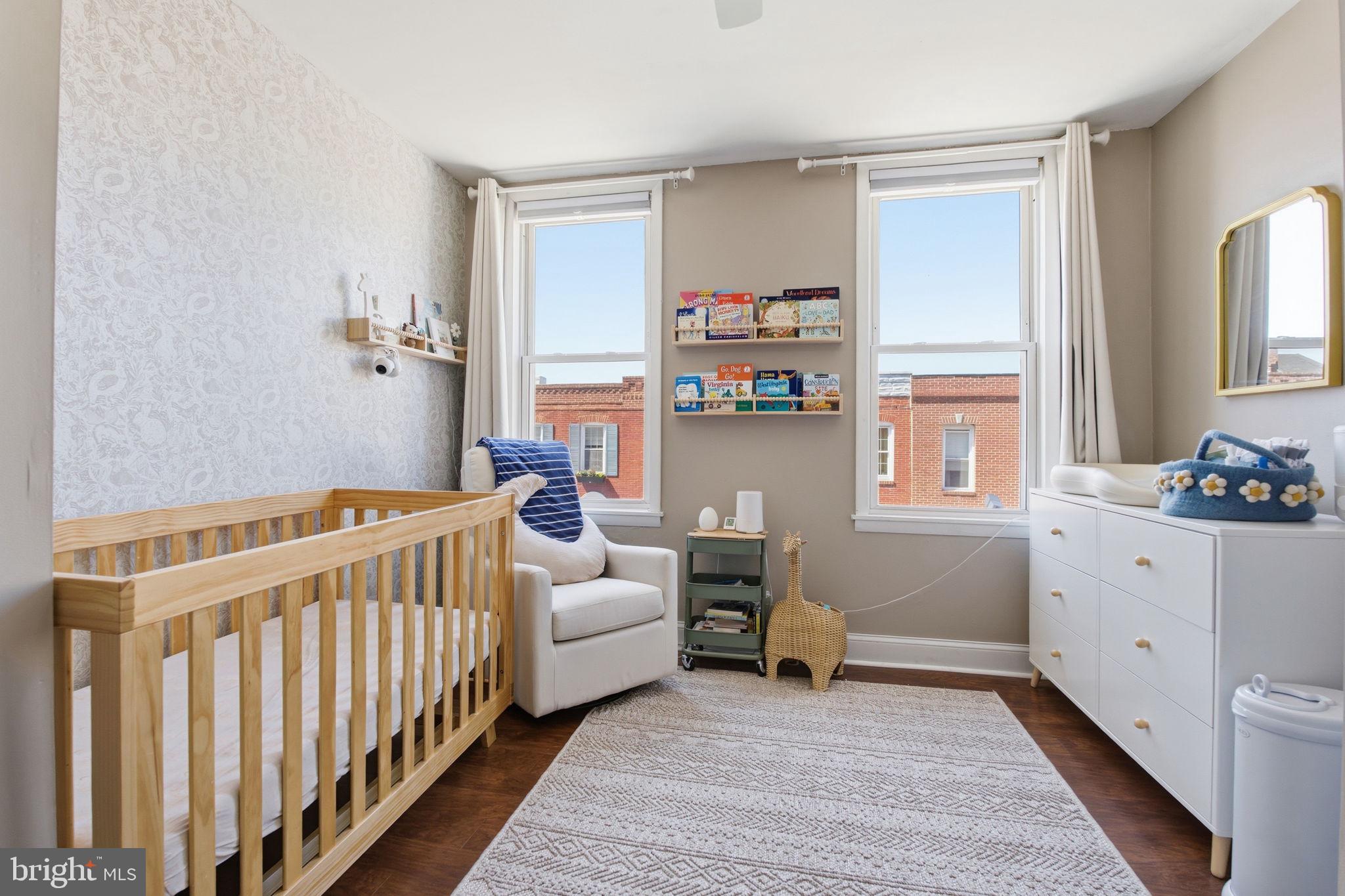 1433 Patapsco Street Baltimore, MD 21230 - Photo 15 of 26 a bedroom with furniture and a window