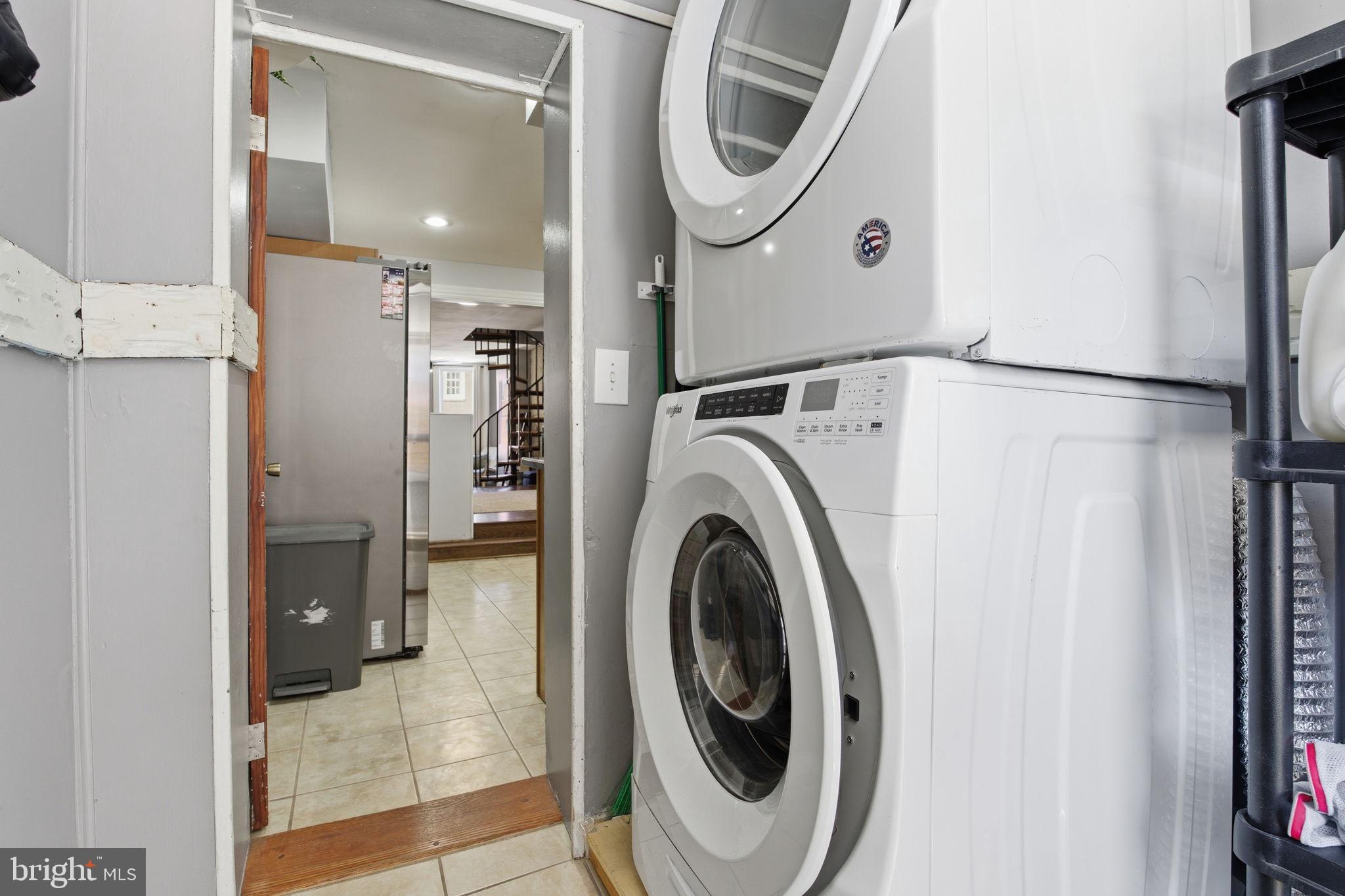 1433 Patapsco Street Baltimore, MD 21230 - Photo 21 of 26 a view of a hallway with washer and dryer