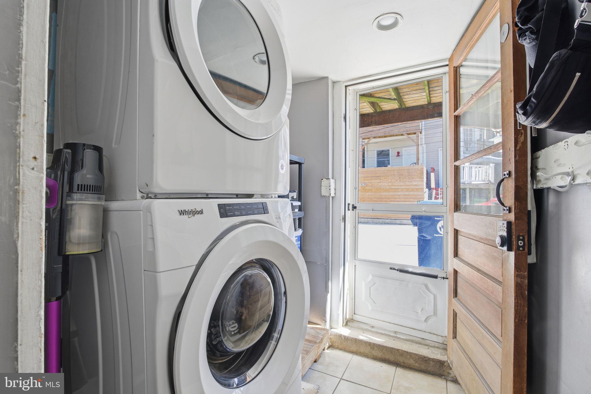 1433 Patapsco Street Baltimore, MD 21230 - Photo 22 of 26 a utility room with dryer and washer