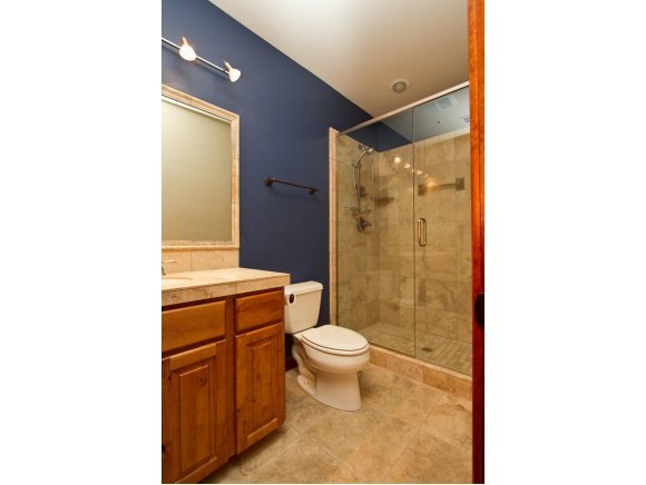4465 Fort Bridger Road Prescott, AZ 86305 - Photo 18 of 23 a bathroom with a toilet and a shower