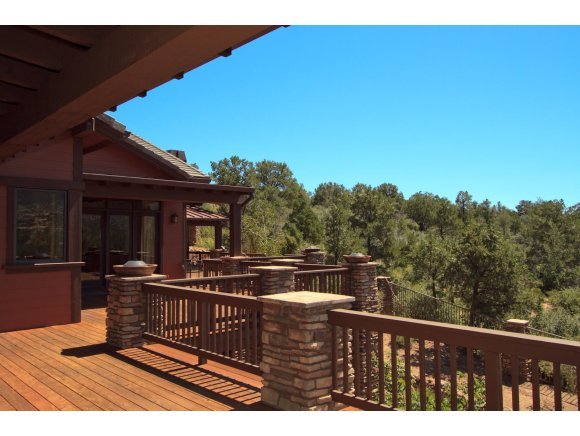 4465 Fort Bridger Road Prescott, AZ 86305 - Photo 4 of 23 a view of a roof deck with wooden fence and floor