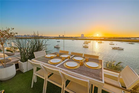 a view of a terrace with furniture and stove