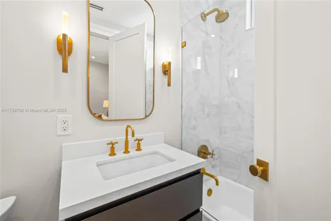 a bedroom with a bed and a table