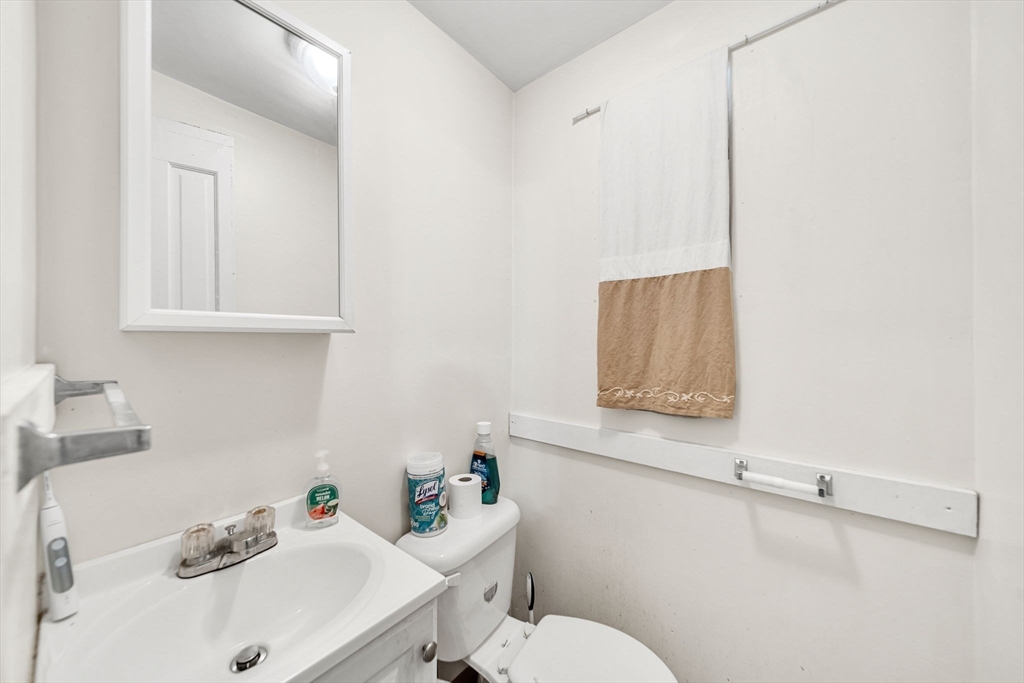 20 Autumn Street Somerville, MA 02145 - Photo 19 of 34 a bathroom with a sink mirror and toilet