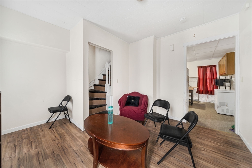 20 Autumn Street Somerville, MA 02145 - Photo 23 of 34 a living room with furniture and wooden floor