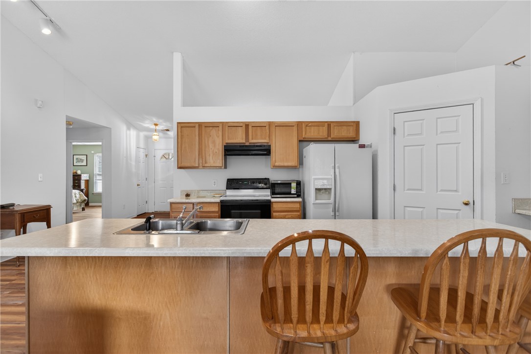 207 Hunters Lane Anderson, SC 29625 - Photo 15 of 46 A well-equipped kitchen offers ample counter space and appliances for daily living.