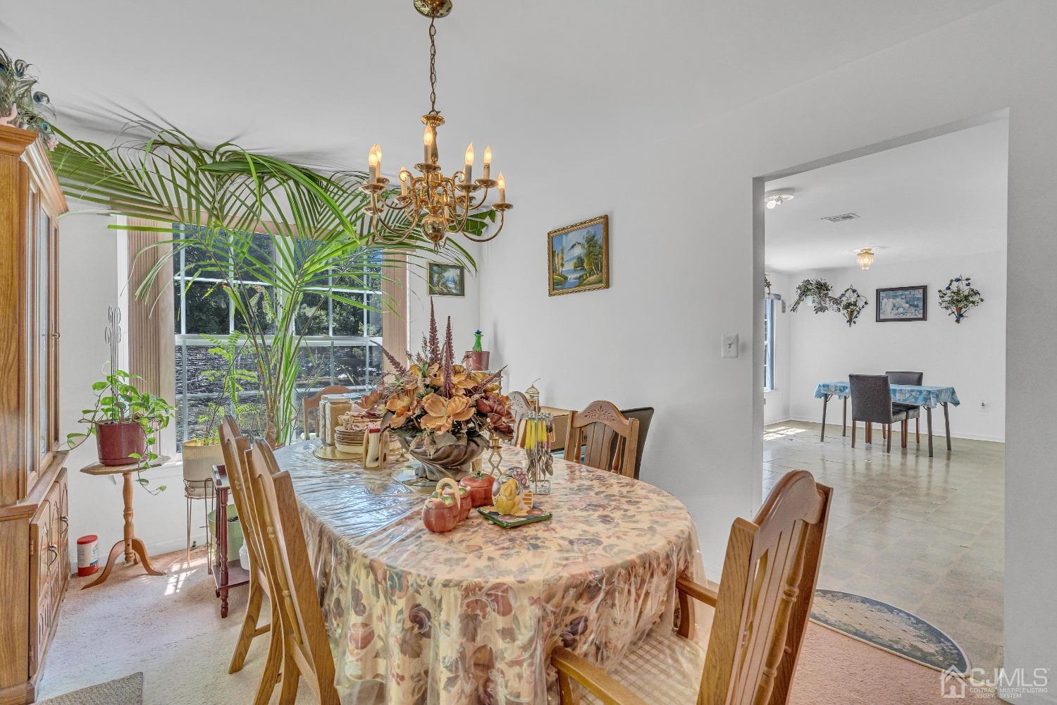 8 Fitzgerald Place Old Bridge, NJ 08857 - Photo 12 of 30 a view of a dining room with furniture window and outside view