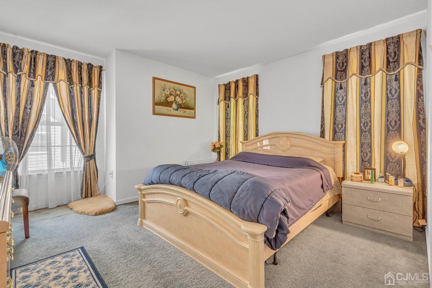 8 Fitzgerald Place Old Bridge, NJ 08857 - Photo 18 of 30 a bedroom with a bed and a window
