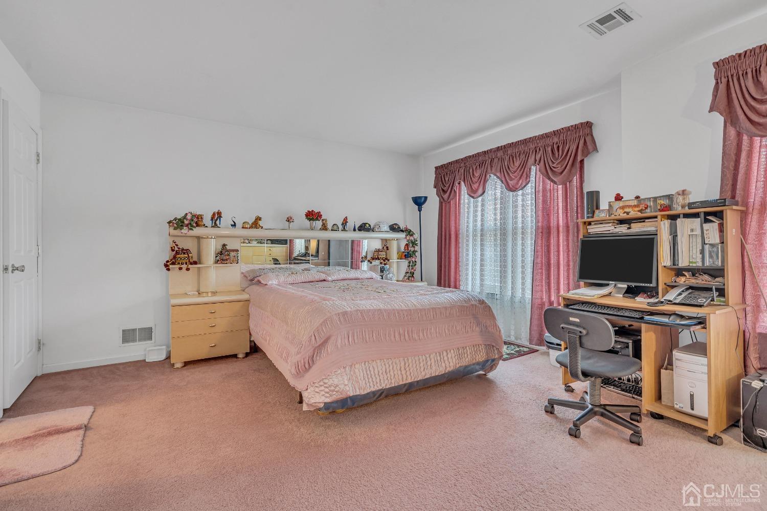8 Fitzgerald Place Old Bridge, NJ 08857 - Photo 21 of 30 a bedroom with a bed and a desk