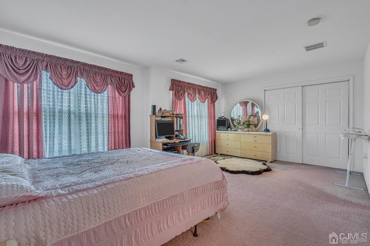 8 Fitzgerald Place Old Bridge, NJ 08857 - Photo 22 of 30 a bedroom with a bed window and dresser