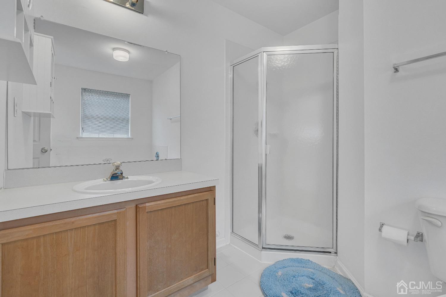 8 Fitzgerald Place Old Bridge, NJ 08857 - Photo 23 of 30 a bathroom with a sink toilet and vanity
