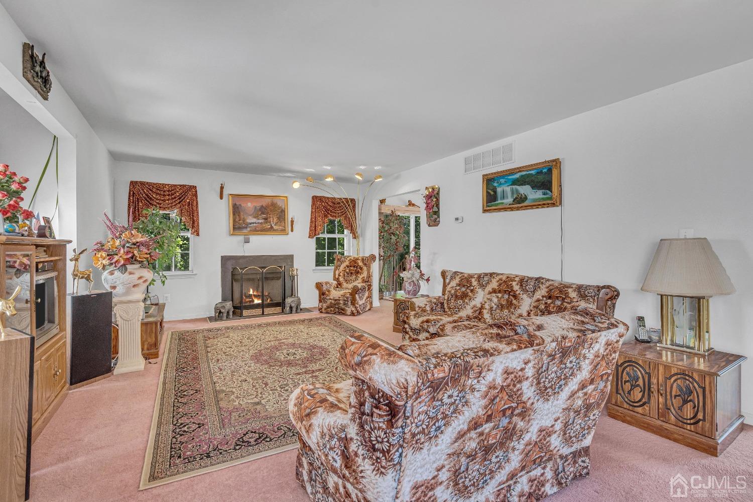 8 Fitzgerald Place Old Bridge, NJ 08857 - Photo 6 of 30 a bed room with a bed and a fireplace