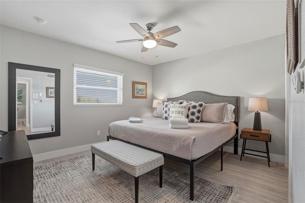 2605 Bay Boulevard Indian Rocks Beach, FL 33785 - Photo 25 of 82 a bedroom with a bed and a table