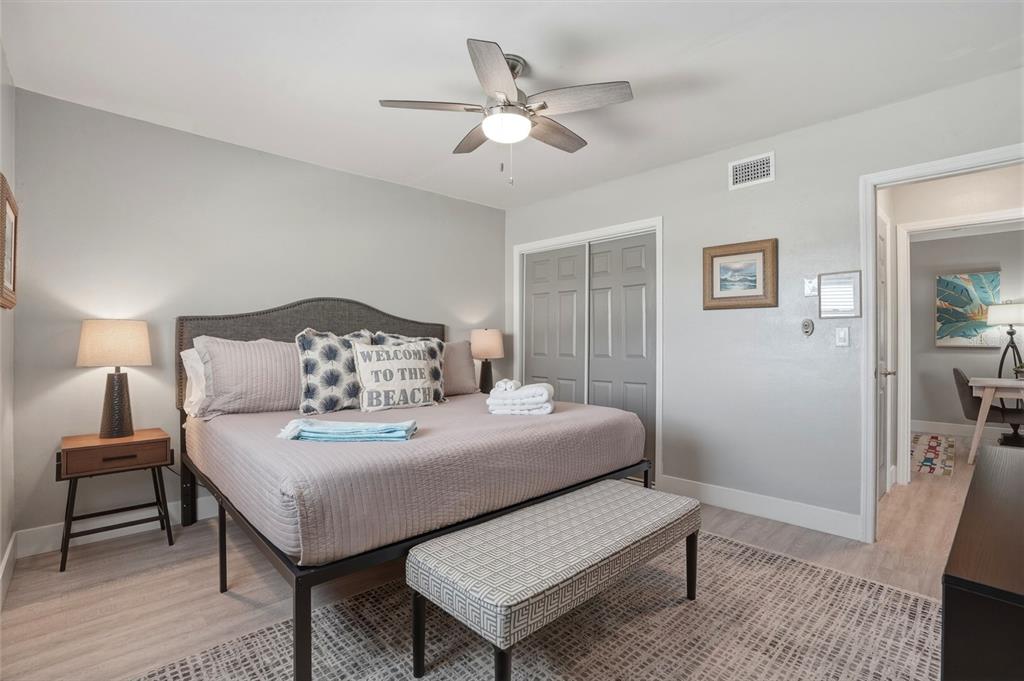 2605 Bay Boulevard Indian Rocks Beach, FL 33785 - Photo 26 of 82 a bedroom with a bed and a table