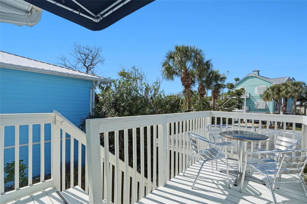 2605 Bay Boulevard Indian Rocks Beach, FL 33785 - Photo 52 of 82 a view of a chairs and deck in the balcony