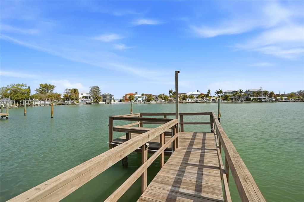 2605 Bay Boulevard Indian Rocks Beach, FL 33785 - Photo 6 of 82 a view of a lake with a large bridge