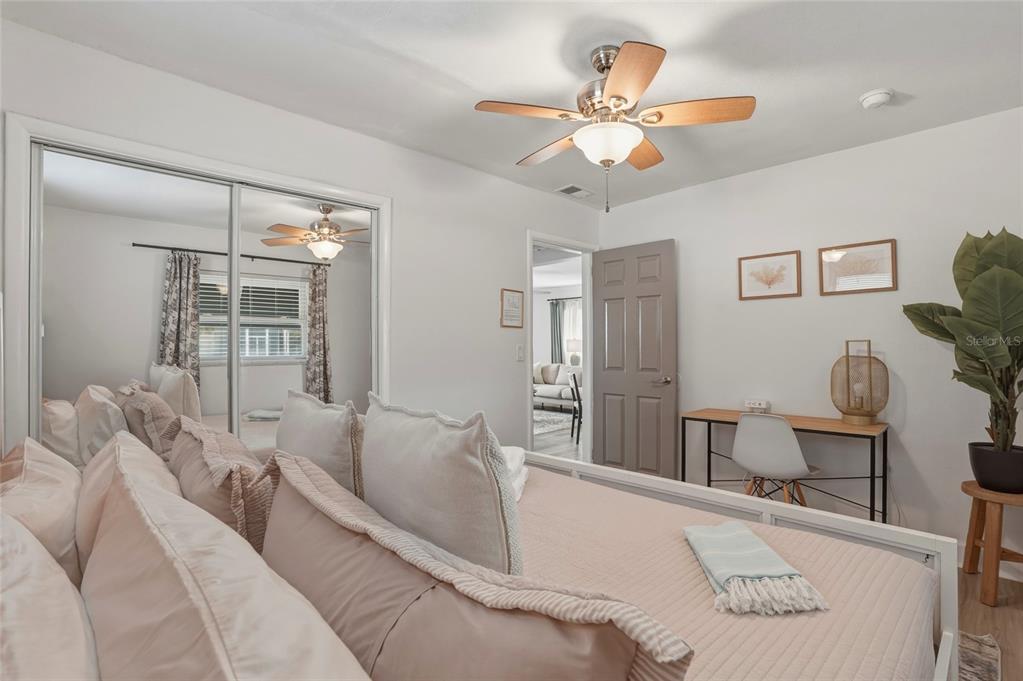 2605 Bay Boulevard Indian Rocks Beach, FL 33785 - Photo 61 of 82 a living room with furniture and a large window