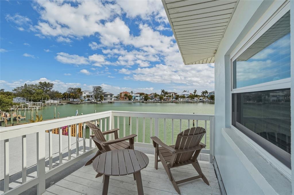 2605 Bay Boulevard Indian Rocks Beach, FL 33785 - Photo 62 of 82 a view of a lake with a deck