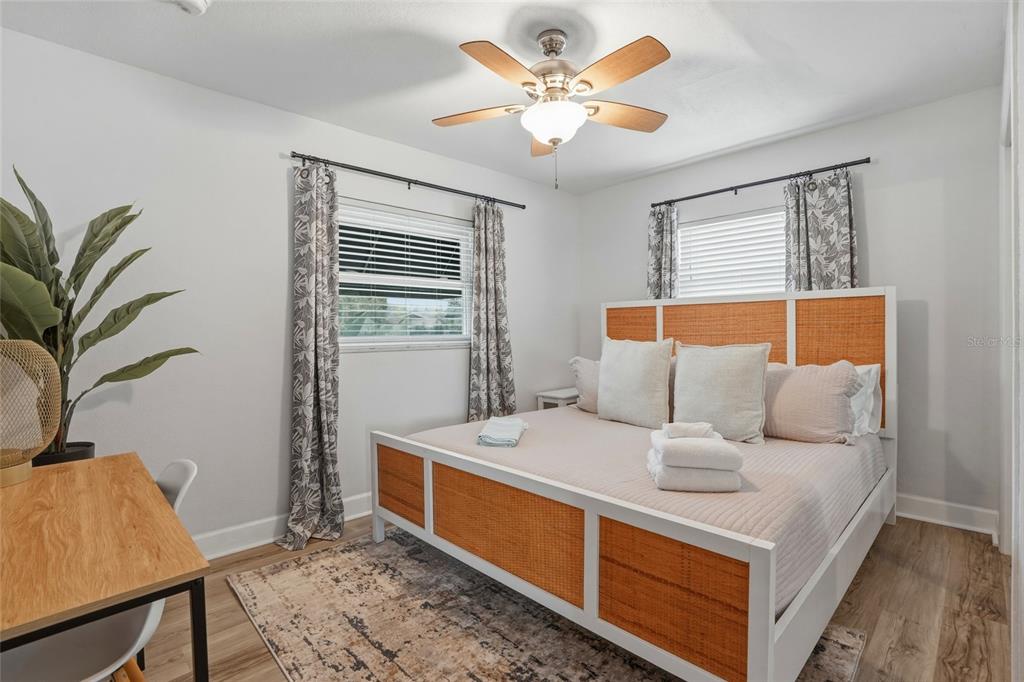 2605 Bay Boulevard Indian Rocks Beach, FL 33785 - Photo 68 of 82 a living room with a bed furniture and a window