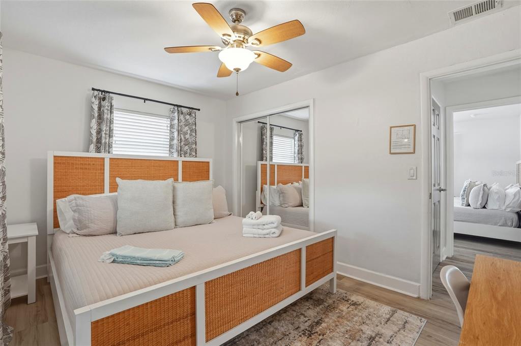 2605 Bay Boulevard Indian Rocks Beach, FL 33785 - Photo 69 of 82 a bedroom with furniture and wooden floor