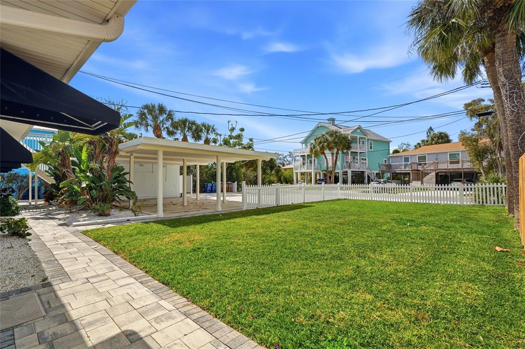 2605 Bay Boulevard Indian Rocks Beach, FL 33785 - Photo 75 of 82 a view of house with garden and patio