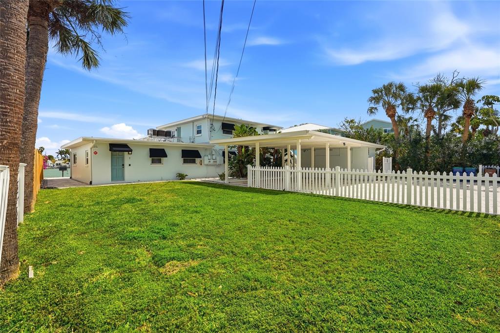 2605 Bay Boulevard Indian Rocks Beach, FL 33785 - Photo 76 of 82 a view of a house with a yard