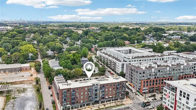 a view of city with tall buildings