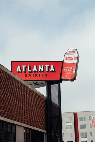 a front view of a building with umbrellas
