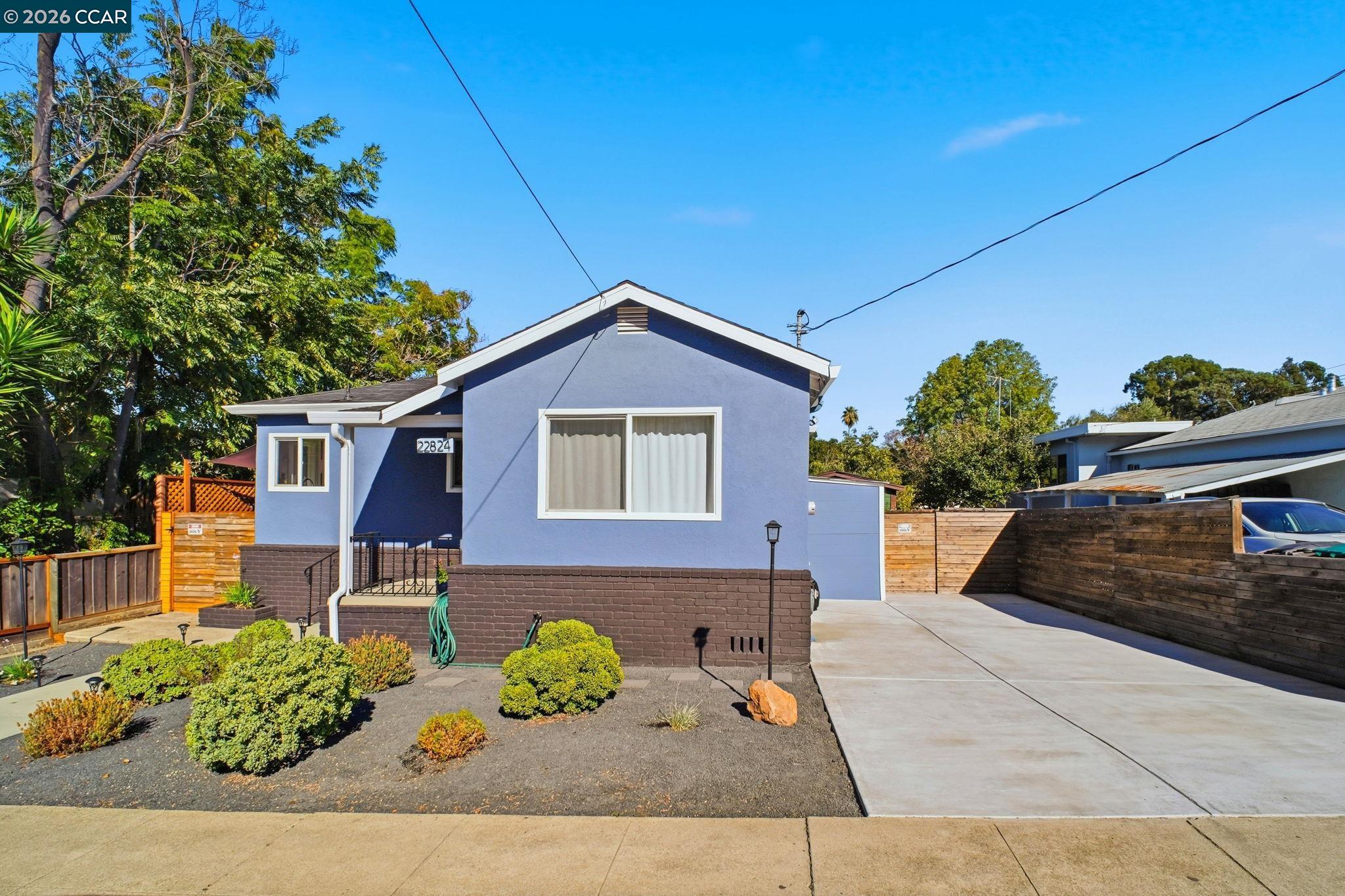 22824 High Street Hayward, CA 94541 - Photo 5 of 28 a view of a house with chair and sitting area