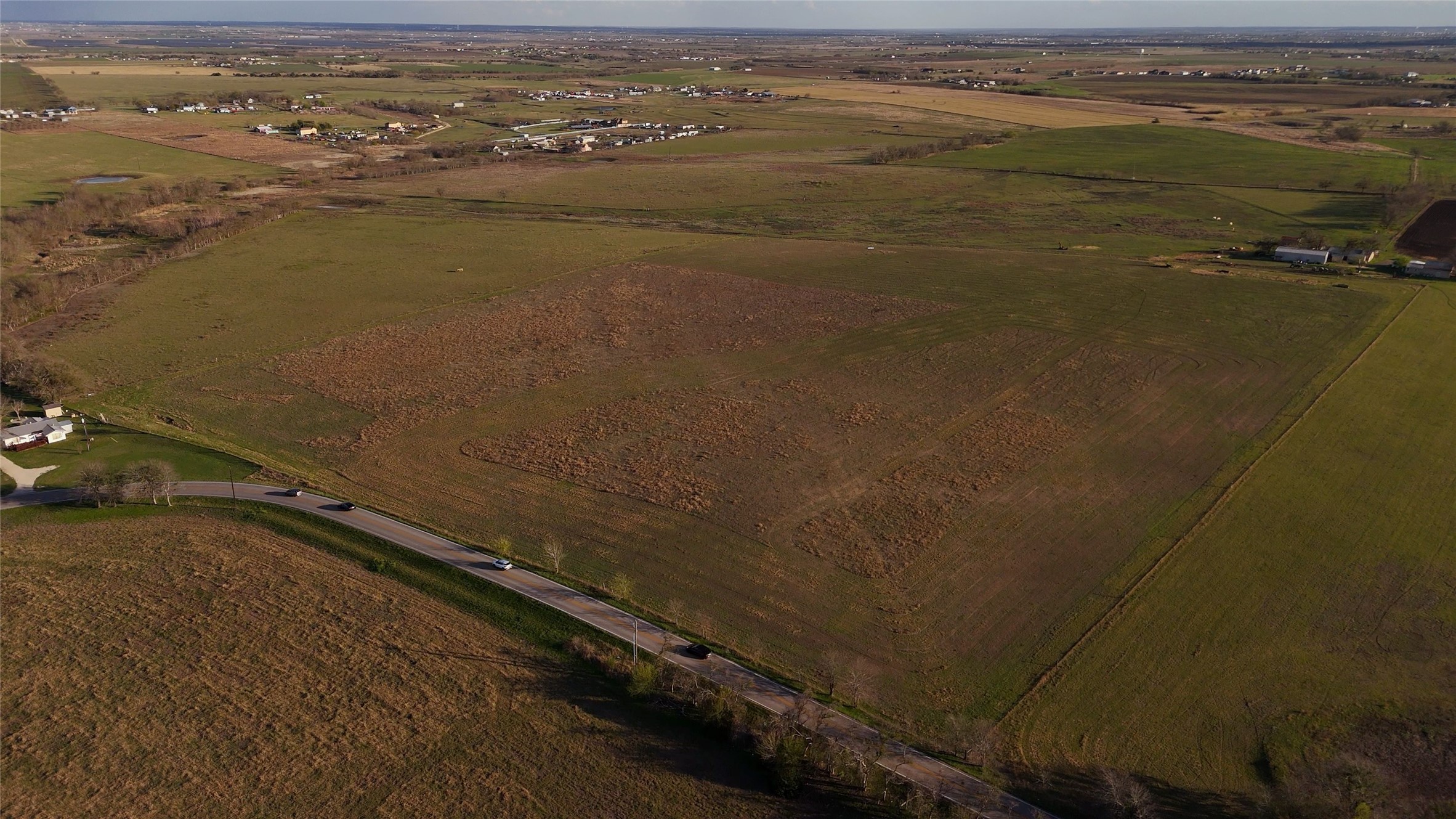 19929 Engelmann Lane Manor, TX 78653 - Photo 5 of 5 an aerial view of ocean and residential houses with outdoor space