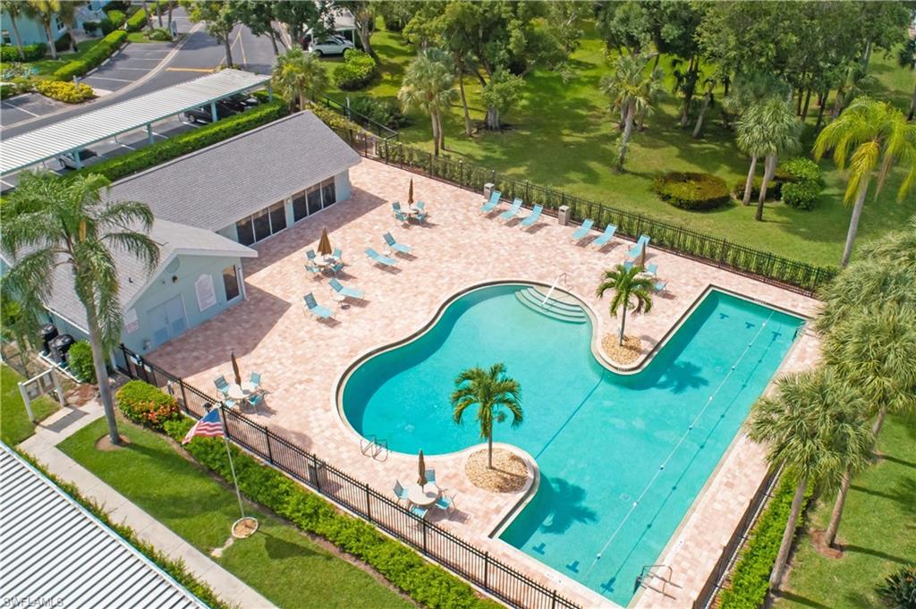 149 Wading Bird Circle, Unit I205 Naples, FL 34110 - Photo 17 of 27 an aerial view of a house