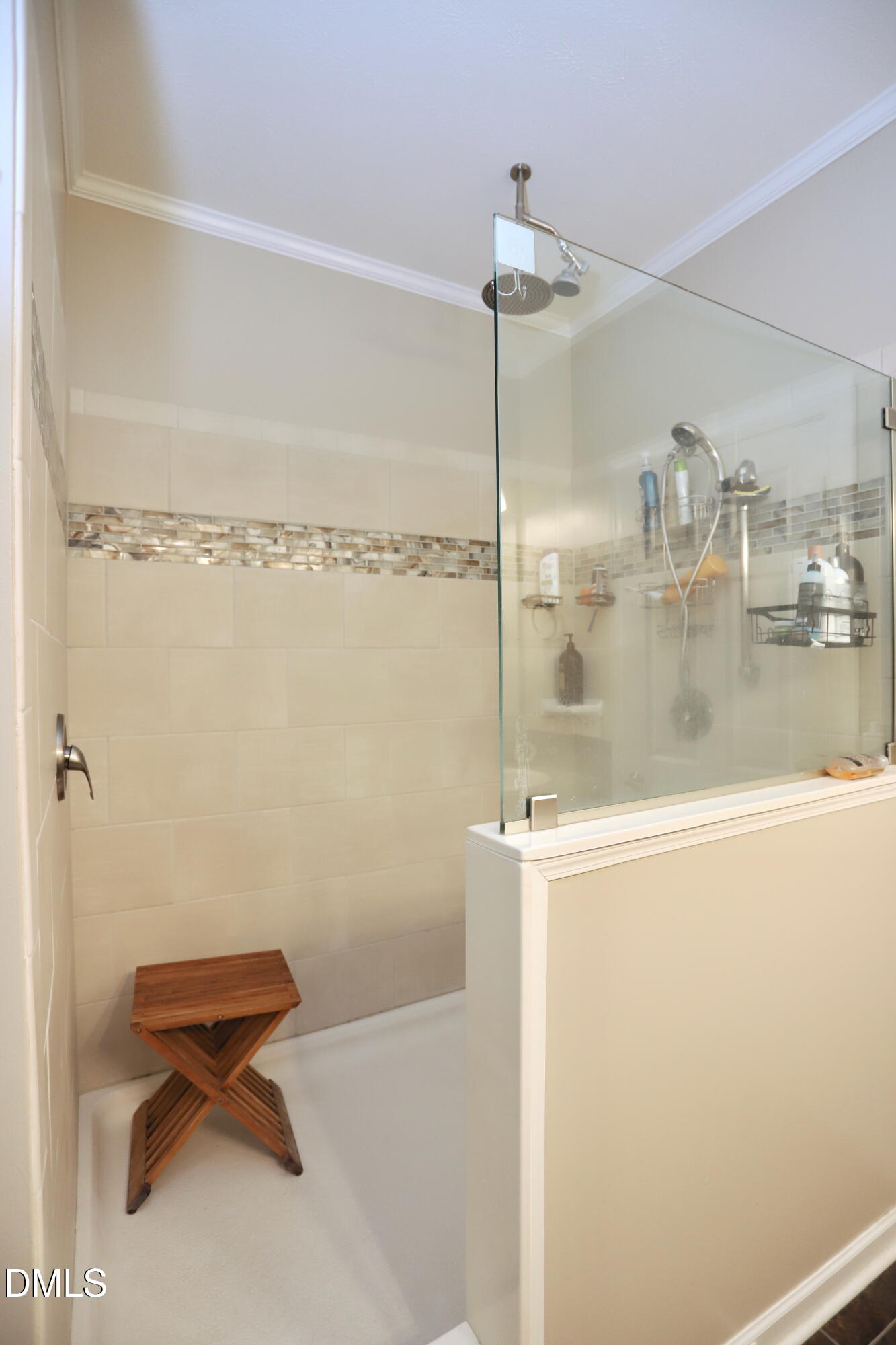 6764 Bradshaw Farm Road Efland, NC 27243 - Photo 24 of 56 a bathroom with a shower