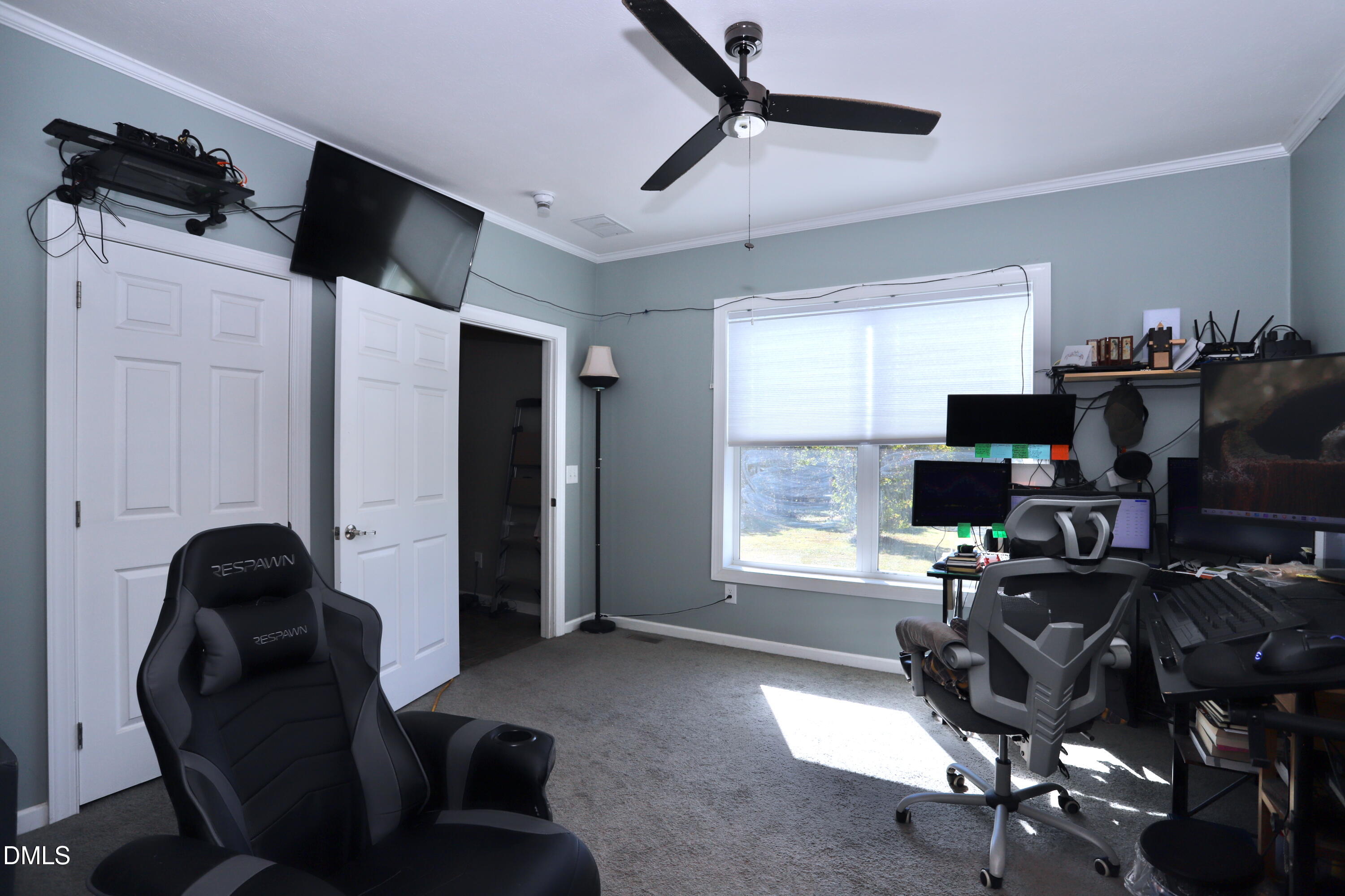 6764 Bradshaw Farm Road Efland, NC 27243 - Photo 25 of 56 a workspace with furniture and a window