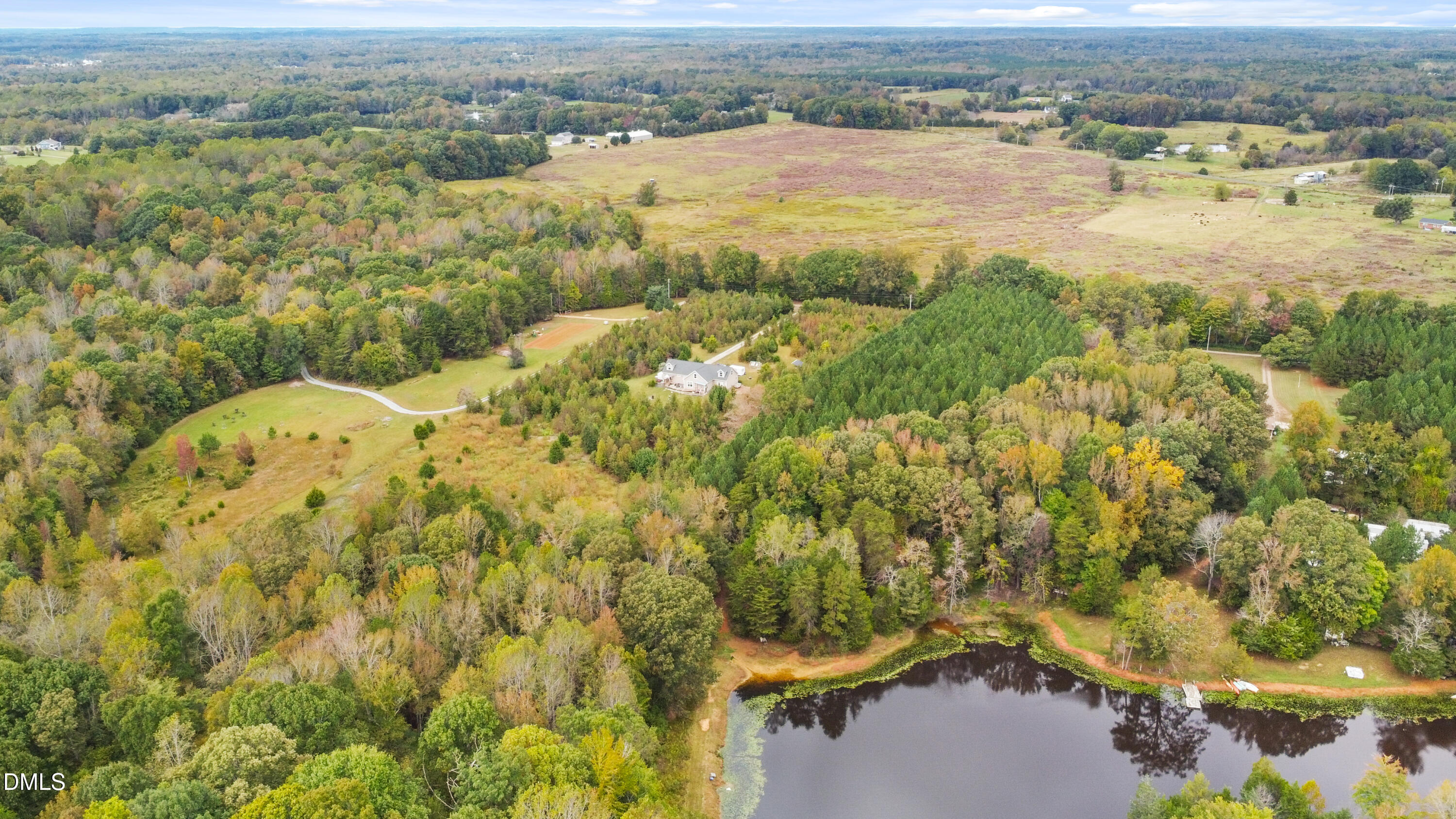 6764 Bradshaw Farm Road Efland, NC 27243 - Photo 45 of 56 an aerial view of residential houses with outdoor space