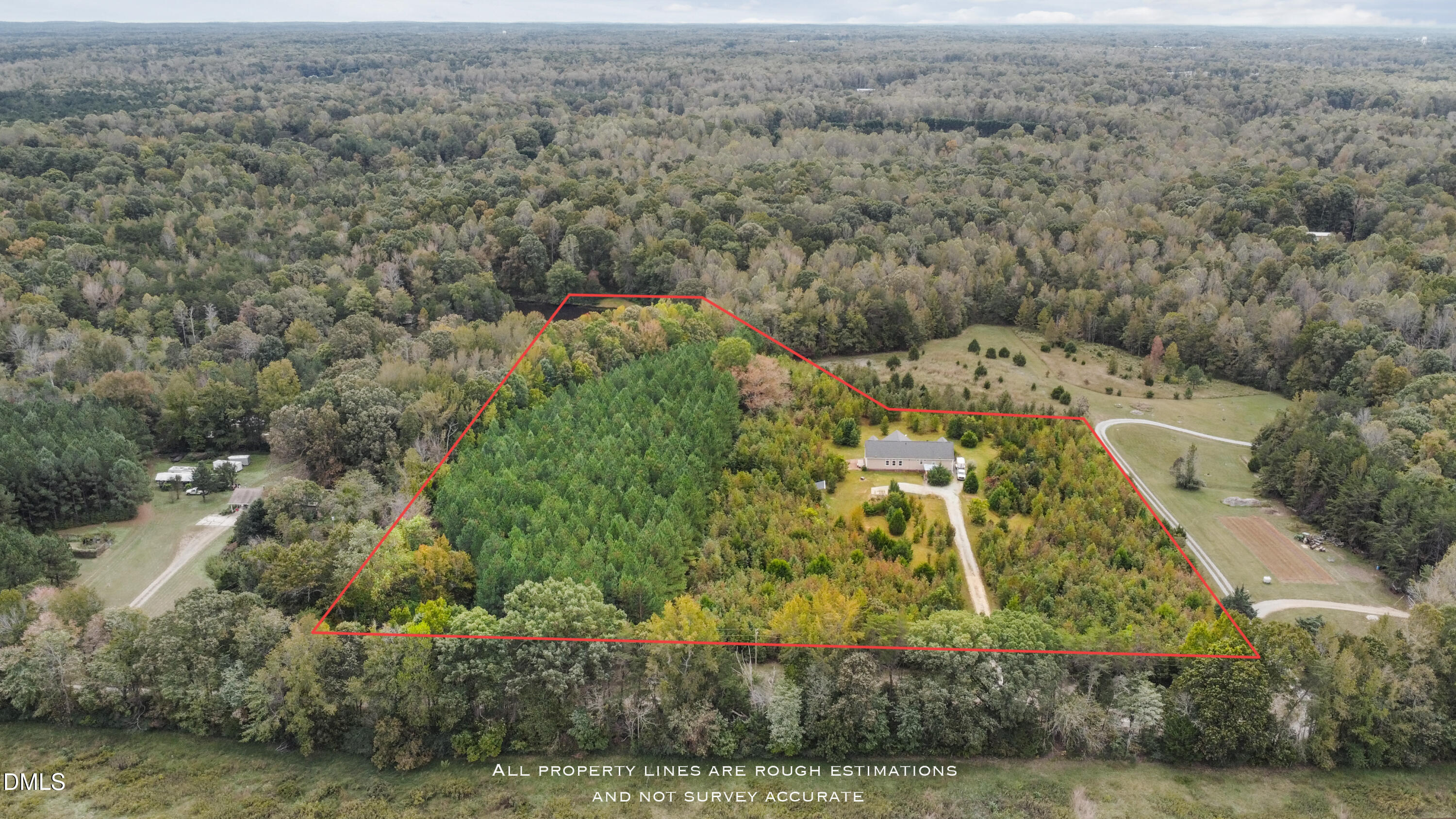 6764 Bradshaw Farm Road Efland, NC 27243 - Photo 49 of 56 an aerial view of residential house with outdoor space
