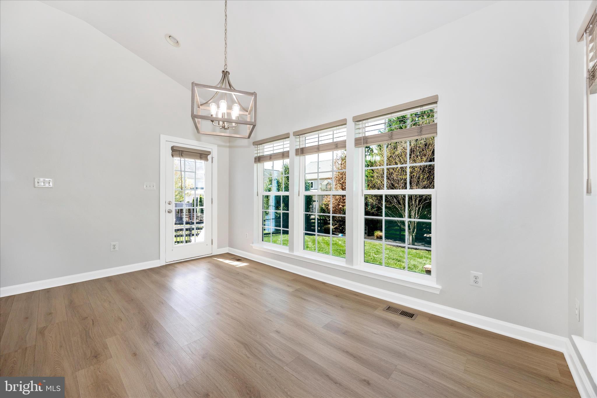 9145 Bealls Farm Road Frederick, MD 21704 - Photo 11 of 88 a view of an empty room with wooden floor and a window