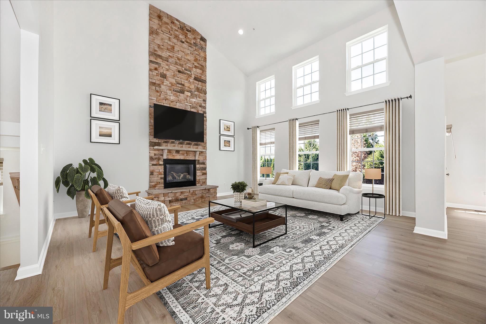 9145 Bealls Farm Road Frederick, MD 21704 - Photo 15 of 88 a living room with furniture fireplace and a flat screen tv
