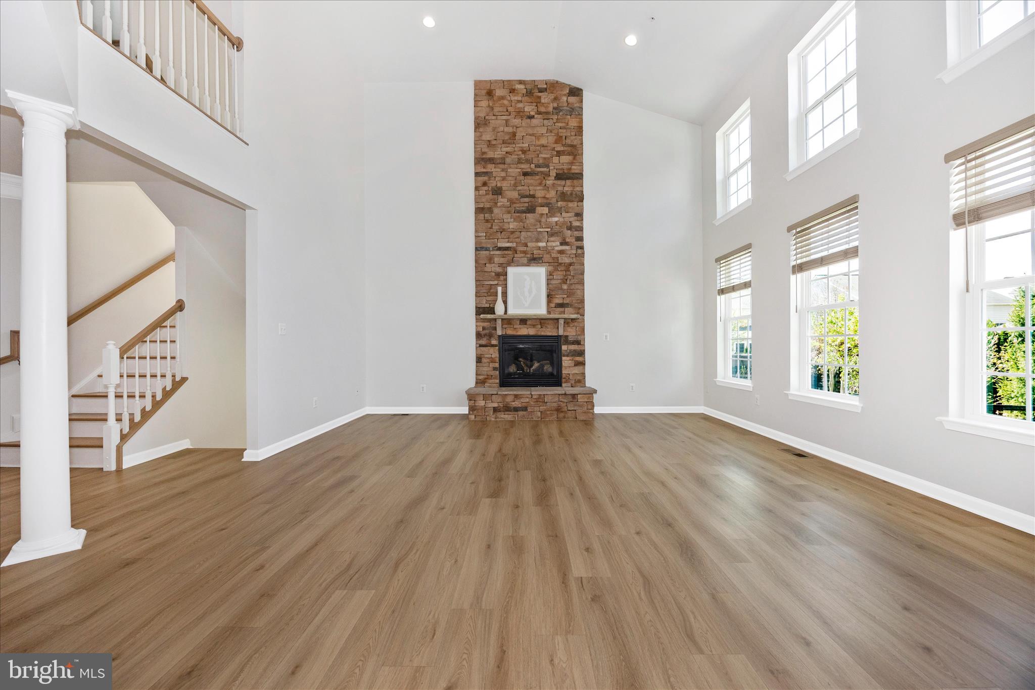 9145 Bealls Farm Road Frederick, MD 21704 - Photo 17 of 88 a view of empty room with wooden floor and fan
