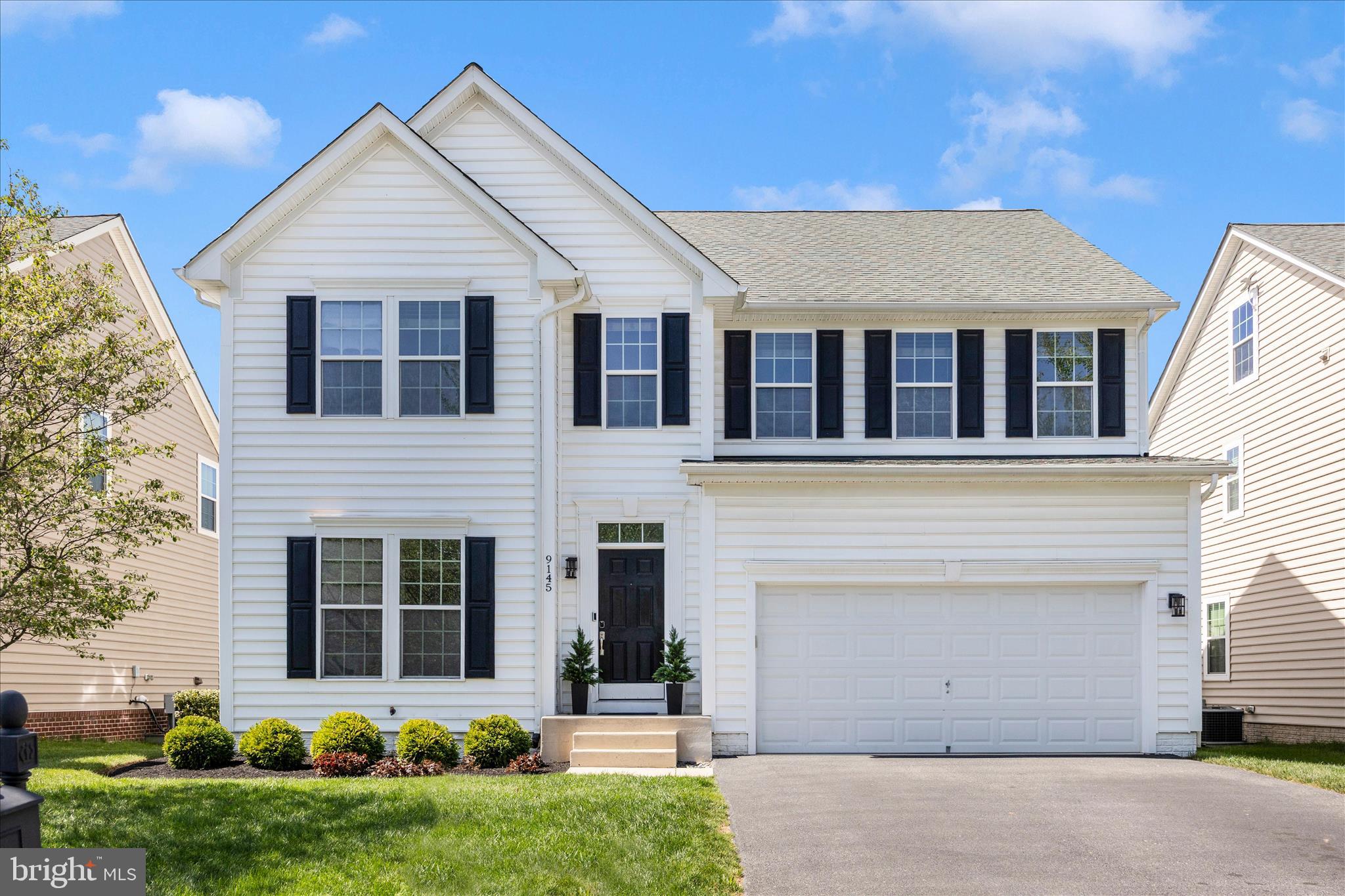 9145 Bealls Farm Road Frederick, MD 21704 - Photo 2 of 88 front view of a house with a yard