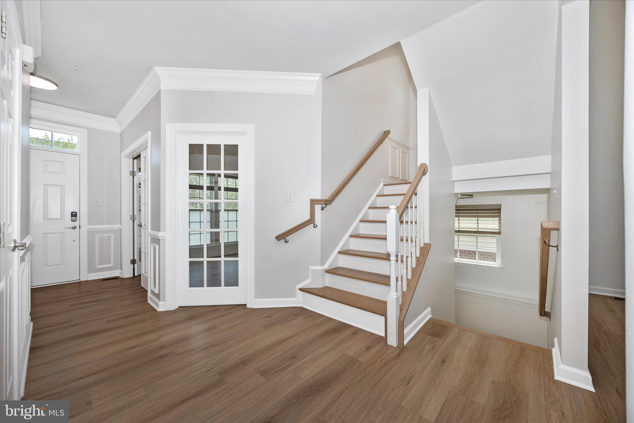 9145 Bealls Farm Road Frederick, MD 21704 - Photo 21 of 88 a view of entryway with wooden floor and stairs