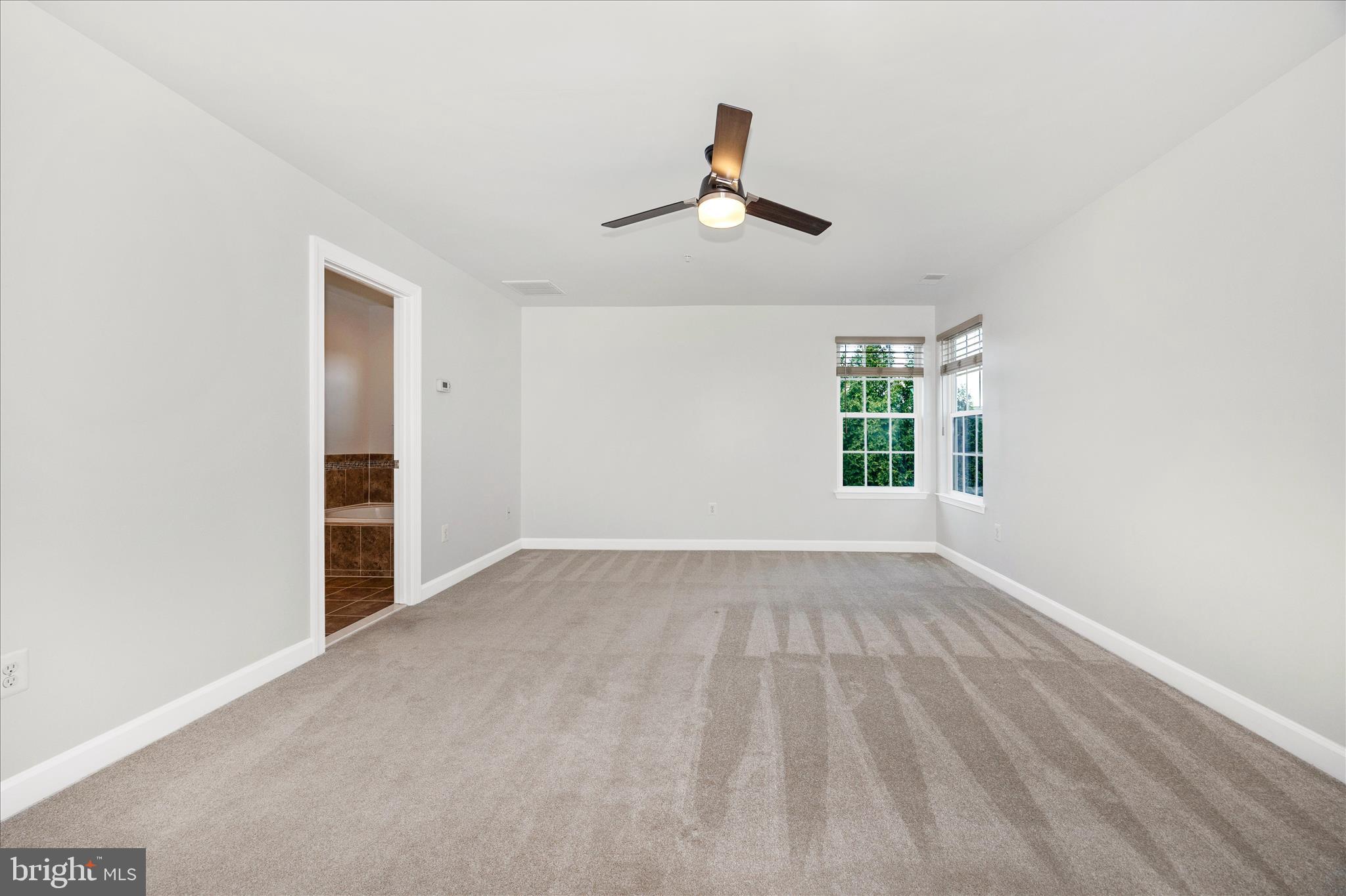 9145 Bealls Farm Road Frederick, MD 21704 - Photo 26 of 88 wooden floor in an empty room with a window