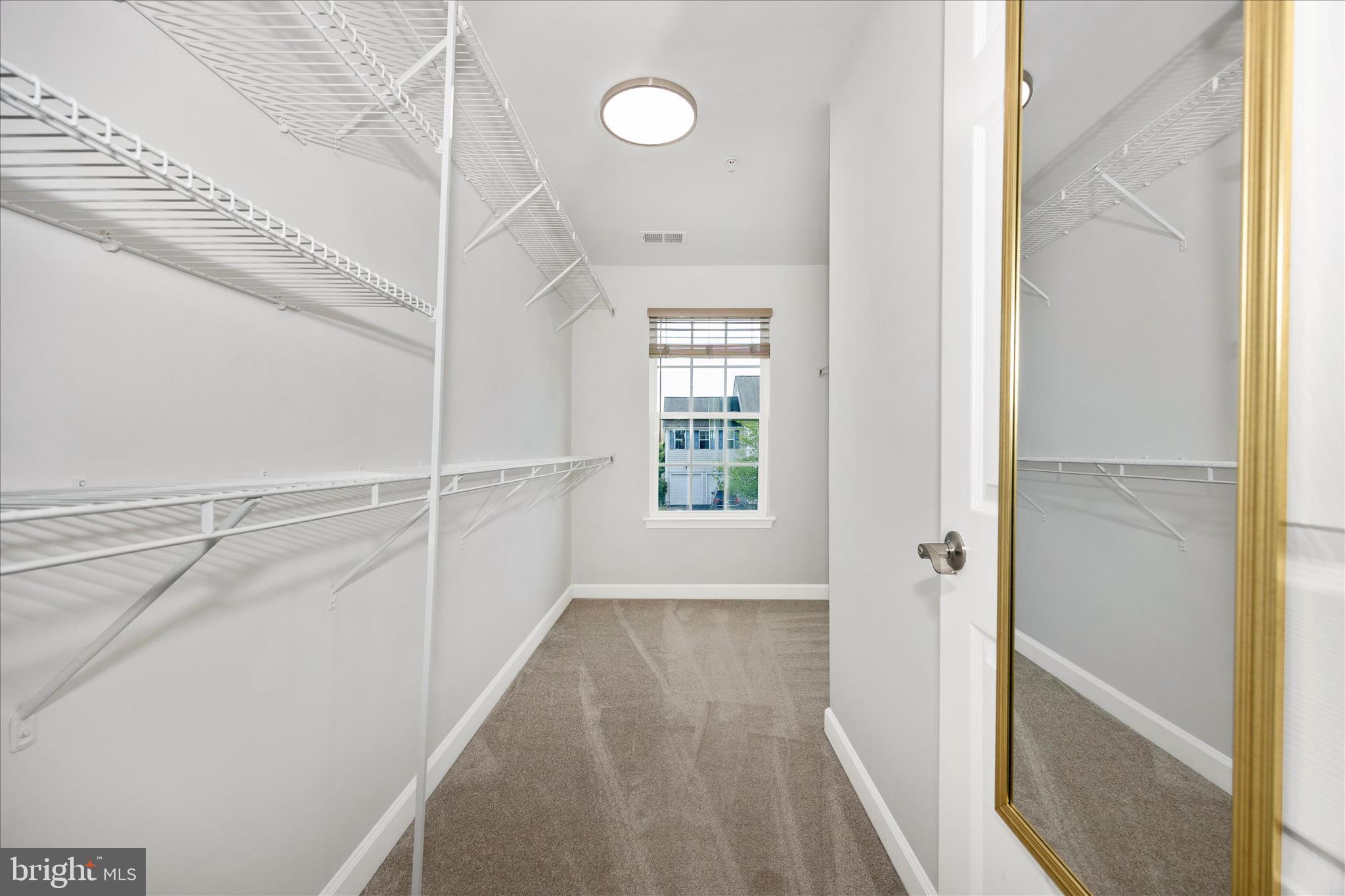 9145 Bealls Farm Road Frederick, MD 21704 - Photo 29 of 88 a view of an empty walk in closet