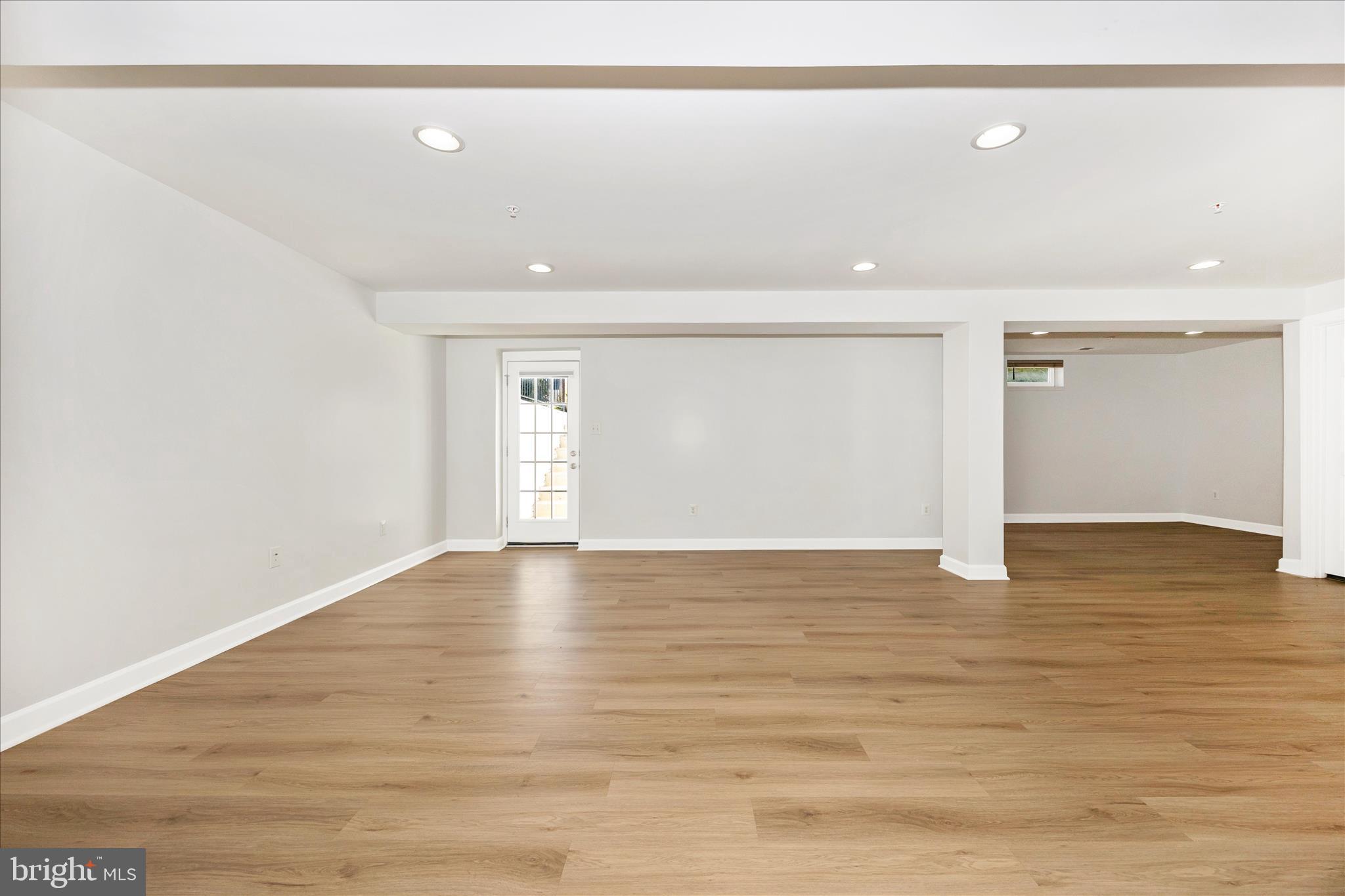 9145 Bealls Farm Road Frederick, MD 21704 - Photo 42 of 88 a view of an empty room with wooden floor