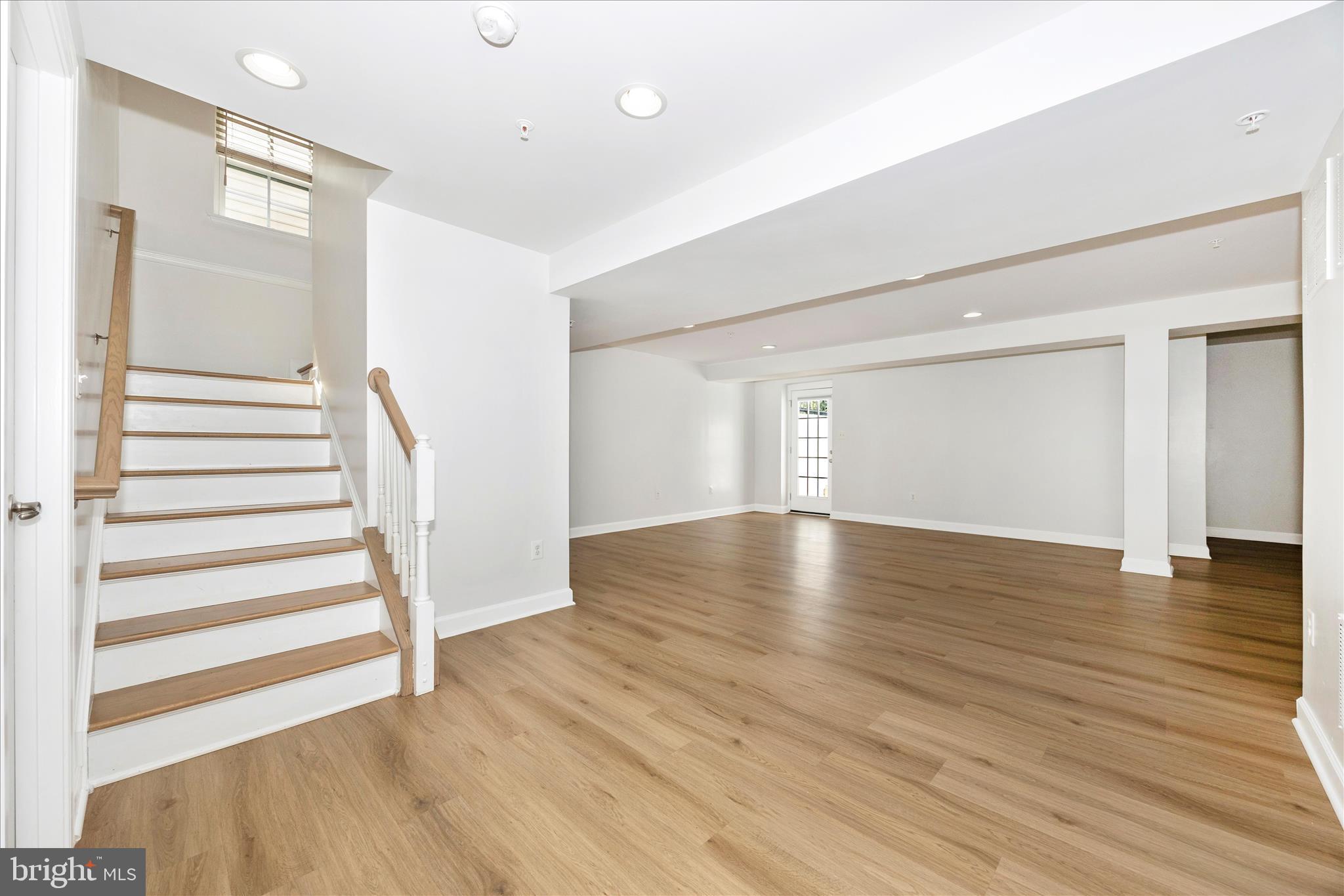 9145 Bealls Farm Road Frederick, MD 21704 - Photo 43 of 88 a view of empty room with wooden floor and fan