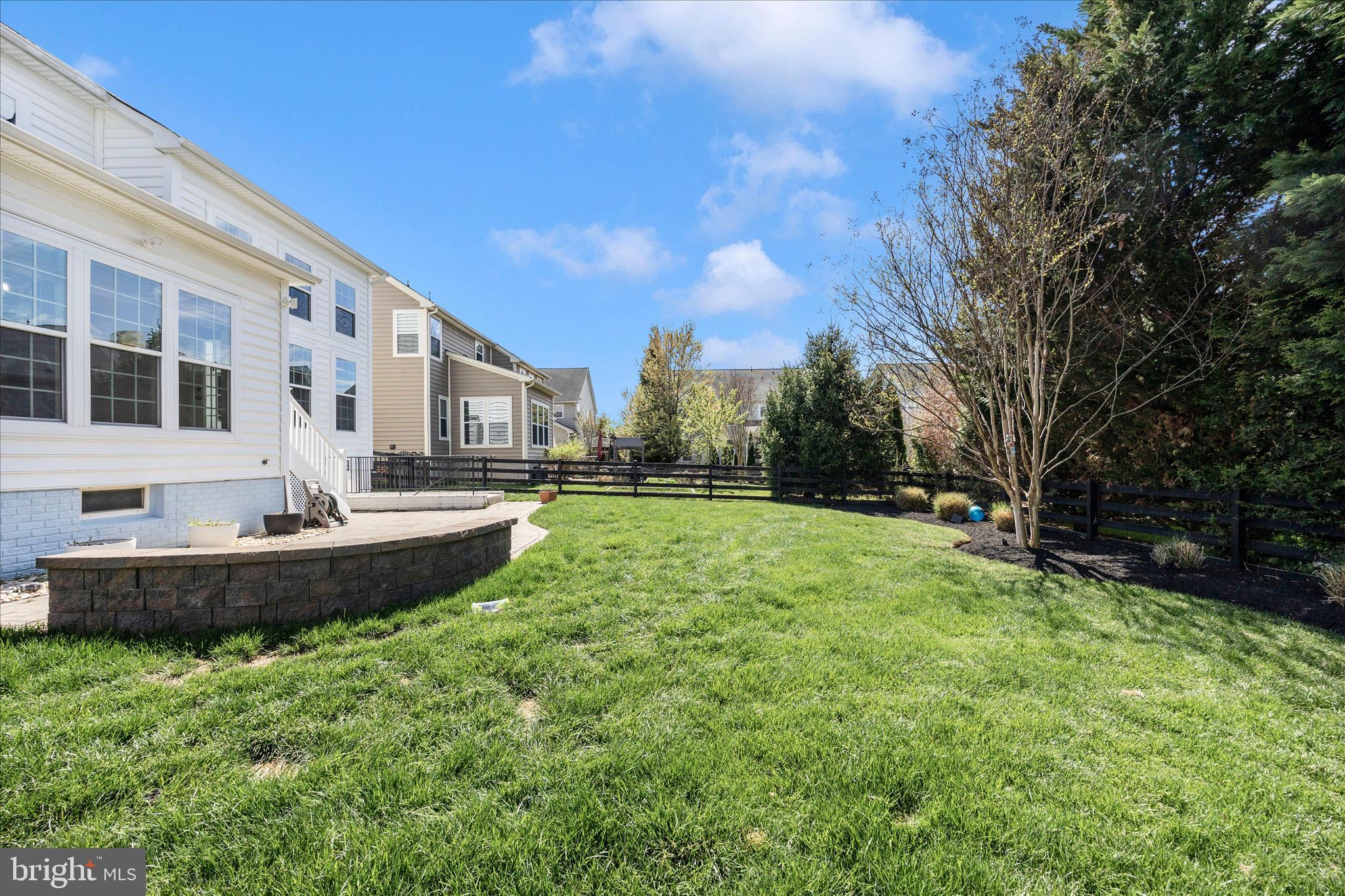9145 Bealls Farm Road Frederick, MD 21704 - Photo 54 of 88 a front view of a house with garden and trees
